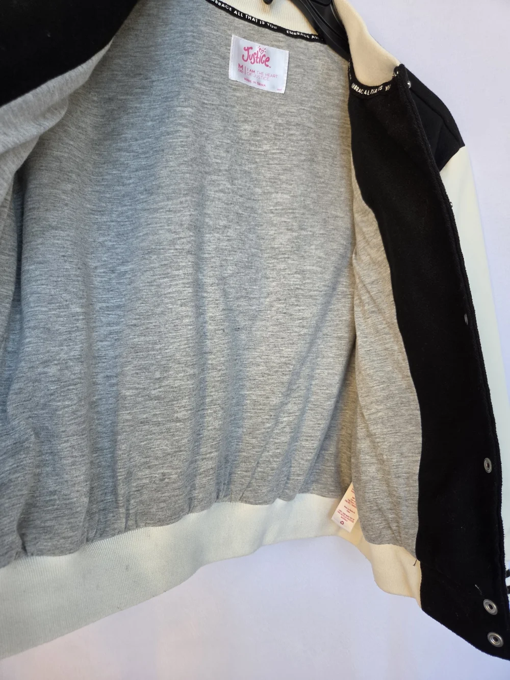 Justice black varsity